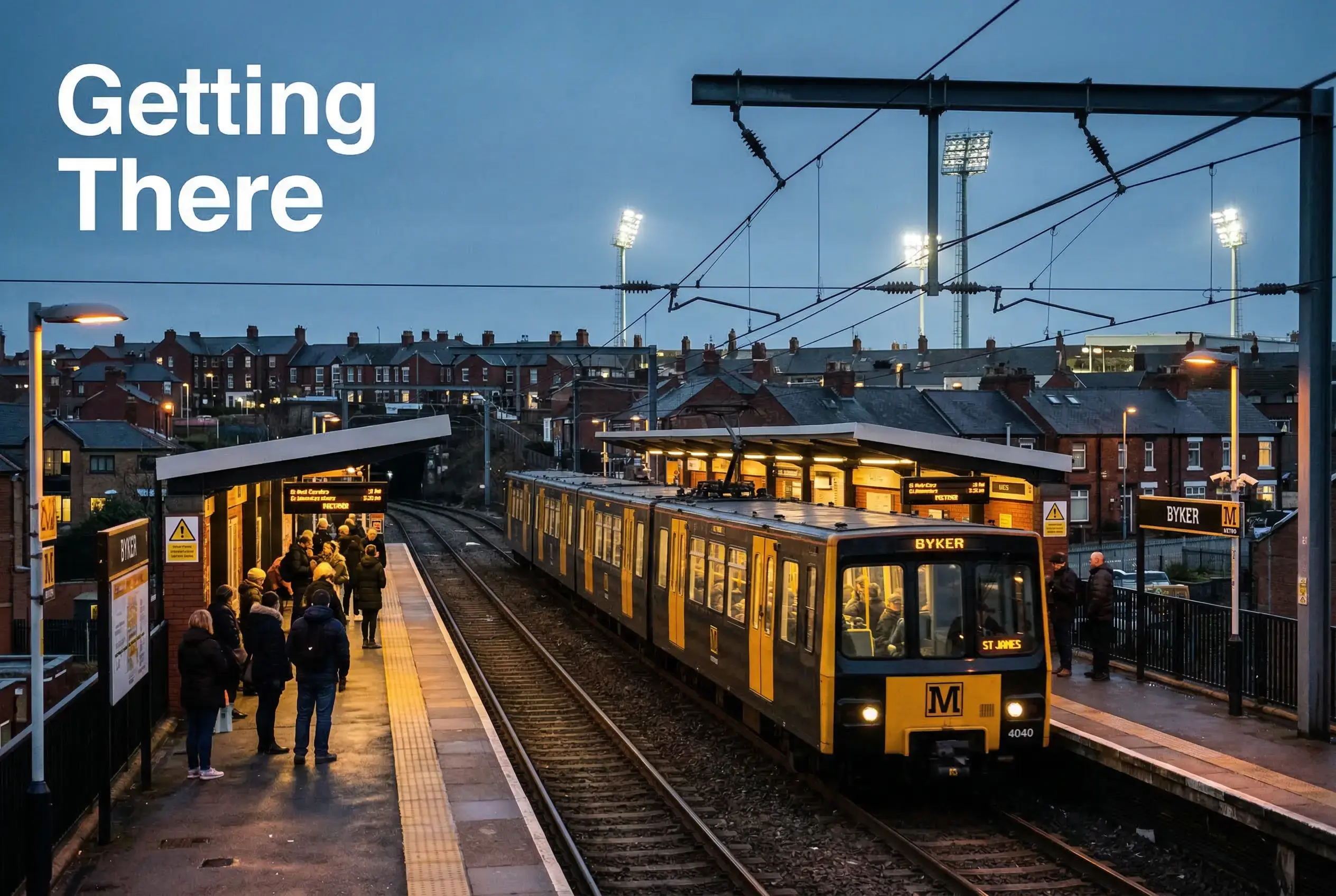 Tyne and Wear Metro train approaching a station near Byker with stadium floodlights in the distance